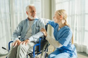 HelpSupportRetirementHealthcareNurseHelpingOldManInWheelchair - Saint Elizabeth Community Short Term Rehabilitation Facilities Near Me